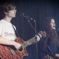 2 students playing music