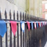 flags on a gate