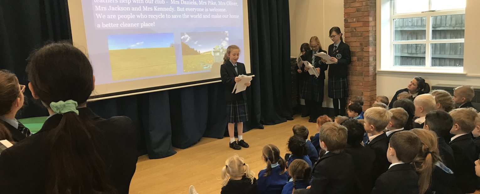 children reading from a script