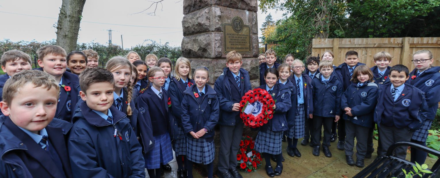 Students with the poppy wreath