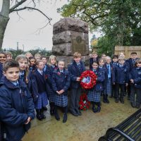 Students with the poppy wreath